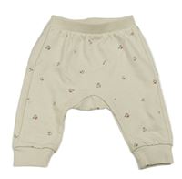 Smetanové květinové baggy tepláky H&M