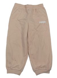 Světlerůžové sportovní kalhoty s logem Puma