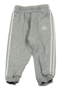 Šedé melírované tepláky s logem Adidas