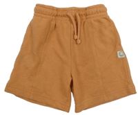 Béžovo-oranžové teplákové kraťasy se smajlíkem George 