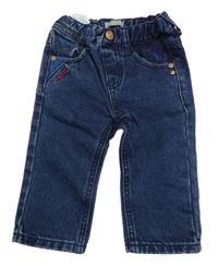 Tmavomodré rifle s nápisy a číslem Tricky Tracks