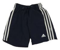 Tmavomodré šusťákové funkční kraťasy s logem Adidas
