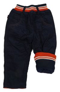 Tmavomodré zatetelené manšestráky s červeným úpletovým pasem 