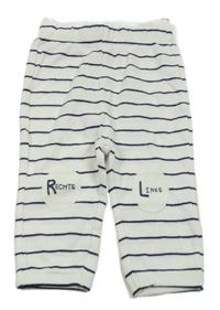 Bílo-tmavomodré pruhované tepláky s nápisem Topomini