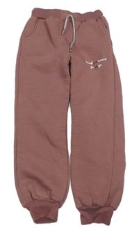 Starorůžové teplé tepláky s nápisy