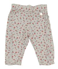 Bílé květované tepláky s volánky