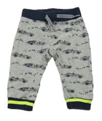 Šedé melírované tepláky s formulemi Dirkje