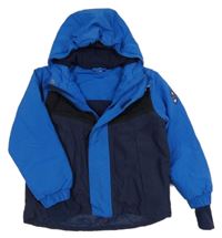 Tmavomodro-modrá šusťáková lyžařská funkční bunda s kapucí Crivit