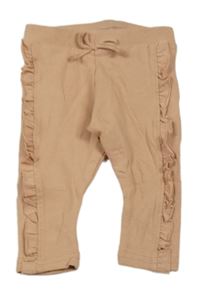 Pudrové legíny s volánkem Primark