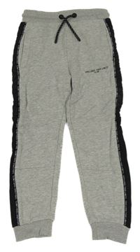 Šedo-černé tepláky s nápisem Nutmeg