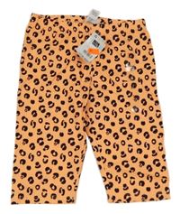 Nové - Neonově oranžovo-černé vzorované capri legíny St. Bernard