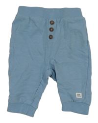 Modré melírované tepláky s nášivkou Topomini