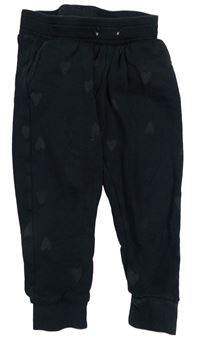 Černé tepláky se srdíčky H&M