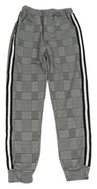 Černo-bílé vzorované kalhoty s proužky Shein