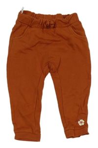 Skořicové tepláky s květinou C&A