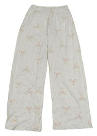 Bílé puntíkaté pyžamové kalhoty s mašlemi