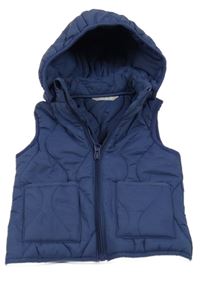 Tmavomodrá šusťáková prošívaná zateplená vesta s kapucí 