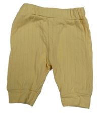 Světležluté vzorované tepláky 