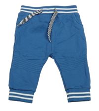 Modré tepláky s proužky 