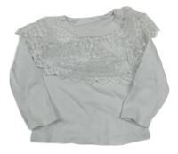 Bílé triko s tylovým volánkem 