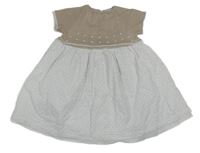 Béžovo-bílé svetrové šaty se vzorovanou sukní 