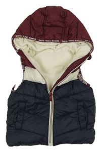 Tmavomodro-vínovová šusťáková prošívaná zateplená vesta s kapuíc Dunnes