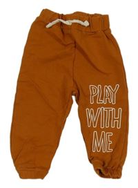 Medové tepláky s nápisem