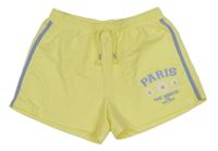 Žluté teplákové kraťasy s květinami a nápisem Dunnes