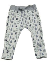 Bílé lehké tepláky s raketami Dirkje