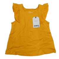 Nové - Hořčicové tričko s volánky s madeirou Next