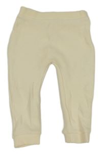 Smetanové pletené tepláky Disney 