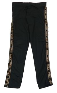 Černé sportovní legíny s nápisy Tu