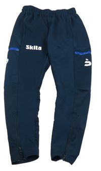 Tmavomodré sportovní tepláky s logem Skita 