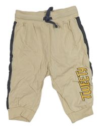 Béžovo-antracitové tepláky s Tweetym