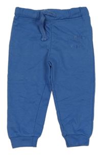 Modré tepláky s nápisem Sinsay