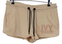 Dámské pudrové teplákové kraťasy s logem Ivy Park 