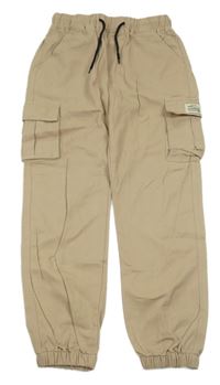 Béžové plátěné cuff kalhoty s kapsami 