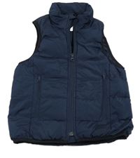 Tmavomodrá šusťáková zateplená vesta GAP