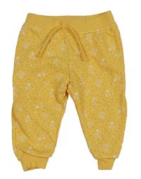 Žluté tepláky s kytičkami Primark