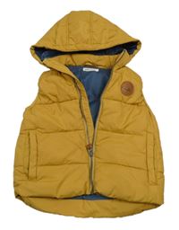 Hořčicová šusťáková prošívaná zateplená vesta s kapucí H&M