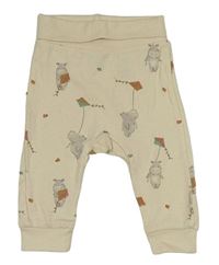 Béžové lehké tepláky s hrochy H&M