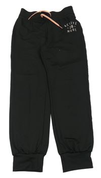 Černé sportovní tepláky s nápisem H&M