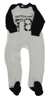 Bílo-černý overal s číslem a míčem 