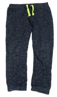 Tmavomodré melírované tepláky 