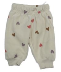 Smetanové fleecové kalhoty se srdíčky H&M