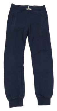 Tmavomodré tepláky s nápisem H&M