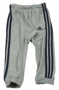 Šedé baggy tepláky s pruhy Adidas
