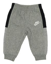 Šedé melírované tepláky s logem Nike 