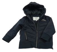 Tmavomodrý prošívaný šusťákovo/softshellový jarní zateplený bomber s nášivkou a kapucí Topolino