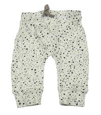 Bílé lehké tepláky s hvězdami